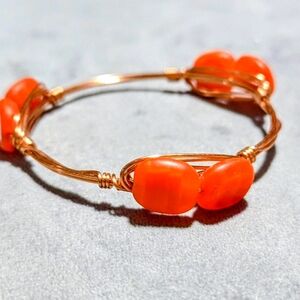 Bourbon and Bowties Bangle Bracelet with Orange Gemstones